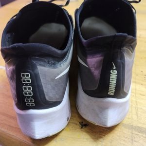 Nike running sneakers heavily used